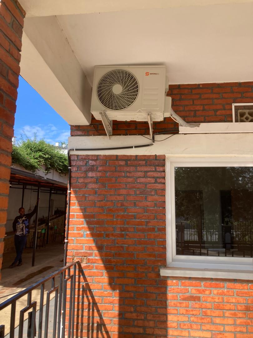 Multiple outdoor AC units on balcony