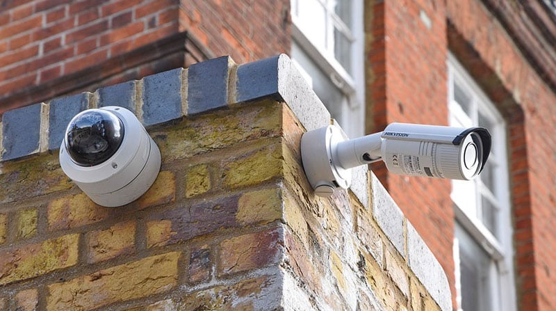 Hikvision CCTV cameras on building corner